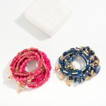 Wholesale set Seven Beaded Stretch Bracelets Painted Puka Cowrie Shells D