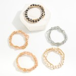 Set Of Four Beaded Stretch Bracelets Featuring Faceted Beads & Metal Tones

- Approximately 3" D