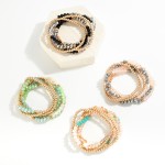 Set of Five Beaded Stretch Bracelets Featuring Gold Tone and Faceted Beads

- Approximately 2.5" D