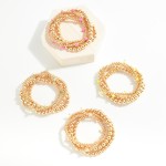 Set of Four Gold Tone Beaded Stretch Bracelets Featuring Faceted Bead Stations

- Approximately 2.5" D