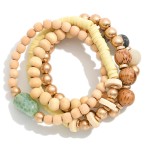 Set of Four Beaded Stretch Bracelets Featuring Wood, Natural Stone, and Heishi Beads

- Approximately 2.5" D