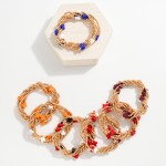 Set of Five Gold Tone Beaded Stretch Bracelets Featuring Criss Cross Bead Stations

- Approximately 2.5" D