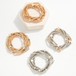 Set Of Five Metal Tone Beaded Stretch Bracelets Featuring Clover Stations 

- Approximately 2.25" D 