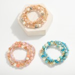 Set Of Four Beaded Bracelets Featuring Faceted Beads, Semi-Precious Stones, & Pearls

- Approximately 2.5" D