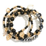 Set Of Four Beaded Stretch Bracelets Featuring Semi Precious Stone, Pearl, & Faceted Beads 

- Approximately 2.75" D