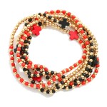 Set Of Six Beaded Stretch Bracelets Featuring Metal Tones & Plus Cross Beads 

- Approximately 2.5" D
