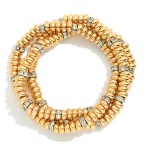 Set Of Three Metal Tone Disk Bead Stretch Bracelets Featuring Rhinestone Details 

- Approximately 2.5" D 

