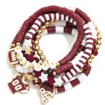 Set Of Seven "Game Day" Heishi Beaded Bracelet Featuring Charms, Gold Tones, And Faceted Beads 

- Approximately 3.5" D 