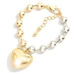 Metal Tone Ball & Tube Bracelet Featuring Puffy Heart Accent 

- Approximately 3" D