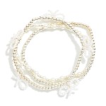 Wholesale set Three Metal Pearl Beaded Stretch Bracelets Bow Details D