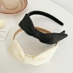 Woven Straw Headband With Top Bow Detail

- One Size Fits Most