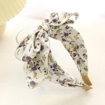 Floral Print Knotted Bow Headband

- One Size Fits Most