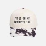 "PUT IT ON MY COWBOY'S TAB" Embroidered Two Tone Faux Cow Fur Baseball Cap

- One Size Fits Most
- Snap Back Closure
- 100% Cotton