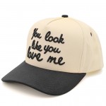 C.C TCM0052
"You Look Like You Love Me" Embroidered Three Tone baseball Cap 

- One Size Fits Most 
- Snap Back Closure 
- 100% Cotton 