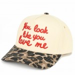 C.C TCM0052
"You Look Like You Love Me" Embroidered Three Tone baseball Cap 

- One Size Fits Most 
- Snap Back Closure 
- 100% Cotton 
