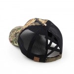 Mossy Oak Brand Camouflage Criss-Cross Ponytail Cap. 

- 60% Cotton, 40% Polyester 
- One Size Fits Most 