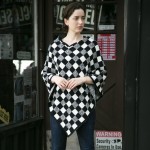 Checkered Print Poncho 

-One size fits most 0-14
-100% Polyester 