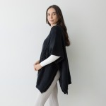 Woven Poncho With Arm Button Detail

- One Size Fits Most 0-14
- 100% Polyester 