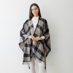 Striped Herringbone Ruana Wrap With Tassel Detail.

- One Size Fits Most (0-14)
- 100% Acrylic