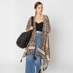 Do Everything In Love Leopard Print Kimono With Tassel Details 

- One Size Fits Most (0-14)
- 100% Polyester 