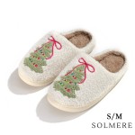 SOLMERE Slippers – Bow Christmas Tree Slide On Slippers

Step into pure indulgence. Our Solmere Slippers blend a trend-forward design with cloud-like comfort, making every step feel like a warm embrace.

- Incredible Comfort – Lined with ultra-soft, plush material to keep your feet cozy from morning to night.
- Slip-On Ease – Effortless to wear, with a secure yet relaxed fit.
- Durable & Lightweight – Crafted for everyday wear with a cushioned sole that supports and lasts.
- US Women's Size: S/M (6-8) M/L (8-10)
- Rubber Sole - Provides grip and stability for both indoor and light outdoor use.
- Thoughtful Packaging – Each pair comes neatly displayed on a branded slipper hanger with a branded card, and individually packaged.

Once you slip them on, you’ll understand why SOLMERE slippers are love at first step.