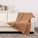 Solmere Blanket – Cable Knit Monochromatic Blanket

Wrap yourself in pure indulgence. Our Solmere Blanket combines a fashion-forward design with an irresistibly soft hand-feel that’s as beautiful as it is cozy.

- Luxuriously Soft – Crafted from ultra-plush, high-quality fibers you’ll want to snuggle into all season long.

- Perfectly Sized – Approximately 50” W x 60” L, perfect for draping over your sofa, bed, or yourself.

- Premium Craftsmanship – 100% polyester for lasting softness, warmth, and easy care.

- Thoughtful Packaging – Each blanket is tied with a branded ribbon in a bow and includes two cards: one featuring the SOLMERE brand and another showcasing a high-quality image of the blanket’s print. Individually packaged

Once you touch it, you’ll understand why SOLMERE blankets are love at first feel.

