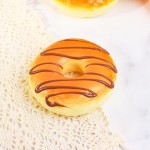 Donut Squishy Toy

Cute novelty squishy toy designed as donut. Perfect for gifts, impulse buys, and themed novelty displays.

- Ages 3+
- Approximately 3" L