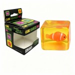 Cube squeeze ball packed in a printed window box, with a molded animal character sealed inside a soft translucent block. Press it and the cube gives, then slowly finds its shape again with the character back in place. A playful desk toy for kids and a quiet fidget for adults. Retail ready packaging makes it easy to hang, stack, or drop into a counter bin.