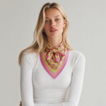 Leopard print bandana scarf cut as a generous square in a lightweight woven fabric. Tie it at the throat over a coat collar, knot it on a tote, or fold it into a hair wrap. The classic spotted repeat works across seasons and pairs with the neutrals shoppers already own. A proven print that moves fast in a counter display.