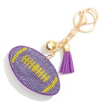 Rhinestone Studded Football Puffer Keyring With Tassel 

- Charm Approximately 3" W
- Total Length 5" L
- Removable Tassel 