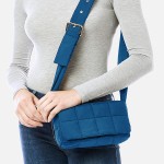 Puffy Quilt Stitch Cross Body Handbag With Adjustable Buckle Strap

- Magnetic Flap Closure
- Two Inner Pockets: One Zipper Closure / One Open
- Approximately 9" L x 4.5" T x 2.5" D
- Strap Drop Adjustable 14" - 22" L