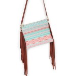 Aztec Crossbody Canvas Bag With Side Tassel Detail 

- Full Zipper Closure
- Fully Lined Inner Pocket With Two Small Open Pockets 
- 100% Polyester 
- Approximately 10.5" W X 9" D 
- Tassel Length 10" L 