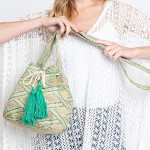 Simple Aztec Bucket Bag 

- Drawstring Closure
- Lined Body With Open & Zipper Pockets
- Approximately 12.75" W X 9.5" T X 7" D
- Strap Drop 23" T
- 50% Polyester 50% Polypropylene 