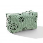 Happy Face Corduroy Make Up Pouch

- Full Zipper Closure
- Lined Interior
- Approximately 7" W X 4" T X  2.5" D