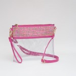 Clear Wristlet With Vegan Leather Trim & Rhinestone Stud Details  

- Zip Closure
- Removeable Wristlet 20"-38" L
- Removable Vegan Leather Crossbody Strap 
- Approximately 9" L X  8" T