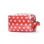 Clear Coat Polka Dot Pouch 

- Full Zip Closure
- Lined Body 
- Side Handle 
- Approximately 8" L X 5" T X 3.5" D
