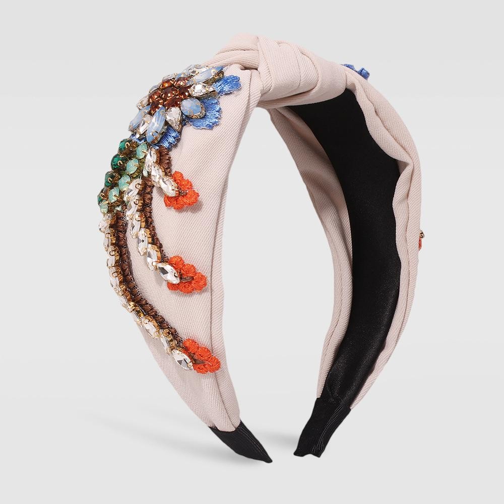 Statement Knotted Headband Featuring Stitched Rhinestone Studded Flowers - One Size Fits Most view 2