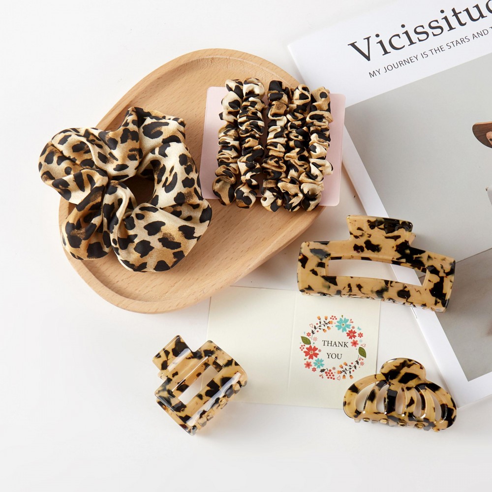 Leopard Theme Hair Accessory Box Box Includes: - 3 Claw Hair Clips - 1 Large Scrunchy - 5 Mini Silky Scrunchies view 2