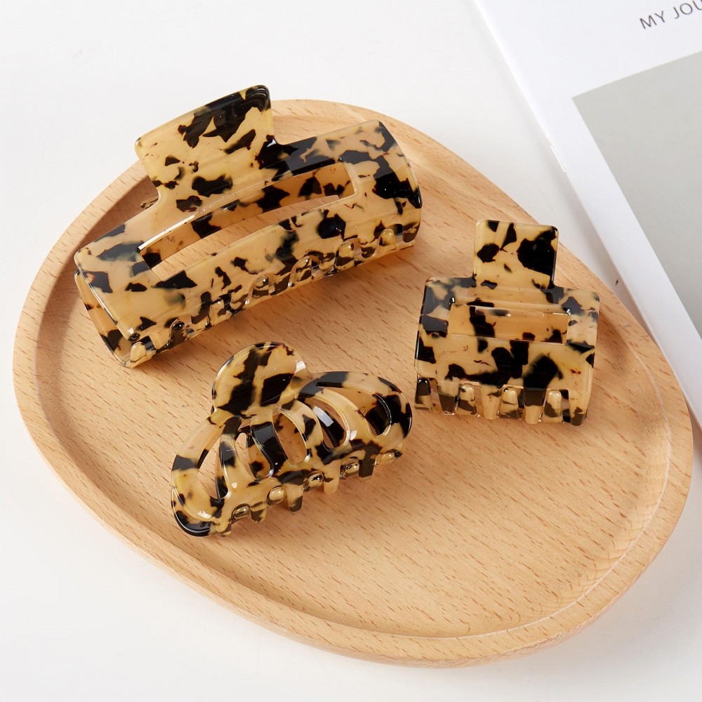 Leopard Theme Hair Accessory Box Box Includes: - 3 Claw Hair Clips - 1 Large Scrunchy - 5 Mini Silky Scrunchies view 6