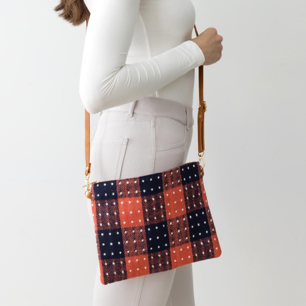 Buffalo Check and Polka-Dot Cross Body Handbag With Detachable Leather Wristlet and Adjustable Strap. - One Inner Pocket With Zipper Closure - Approximately 10” W x 8” T - Strap Drop Approximately 13” - 27” L - 100% Polyester view 2