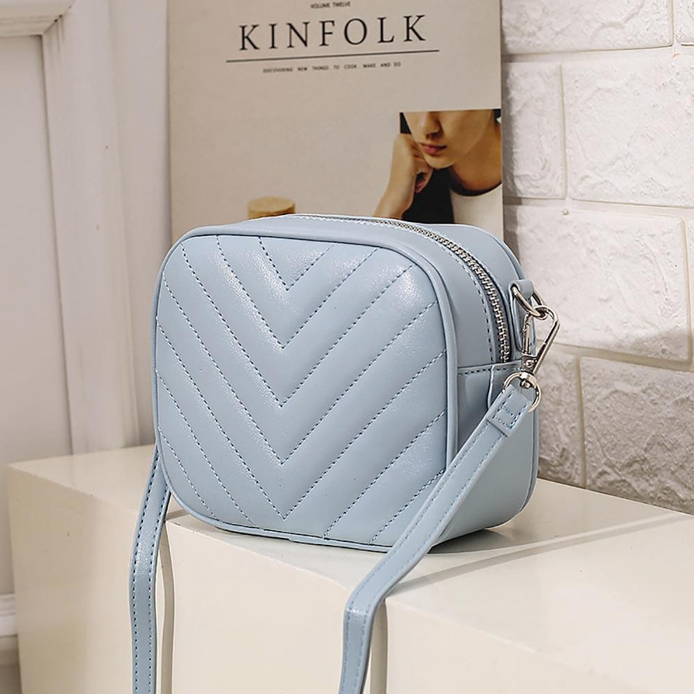 Faux Leather Chevron Quilted Crossbody Bag - Full Zip Closure - Lined With Two Internal Pockets - Adjustable Buckle Strap - Approximately 5.5"H x 7"L x 2.5"D view 2