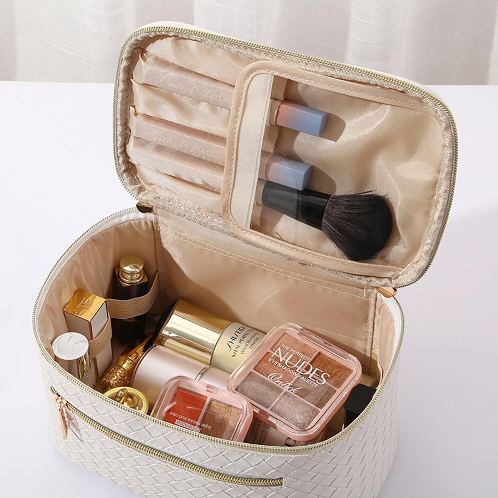 Vegan Leather Woven Travel Makeup Case - Full Double Zip Closure - Front Zip Pocket - Multiple Inside Pockets and Elastic Bands - Approximately 8"W x 4"H x 5.5"D view 4
