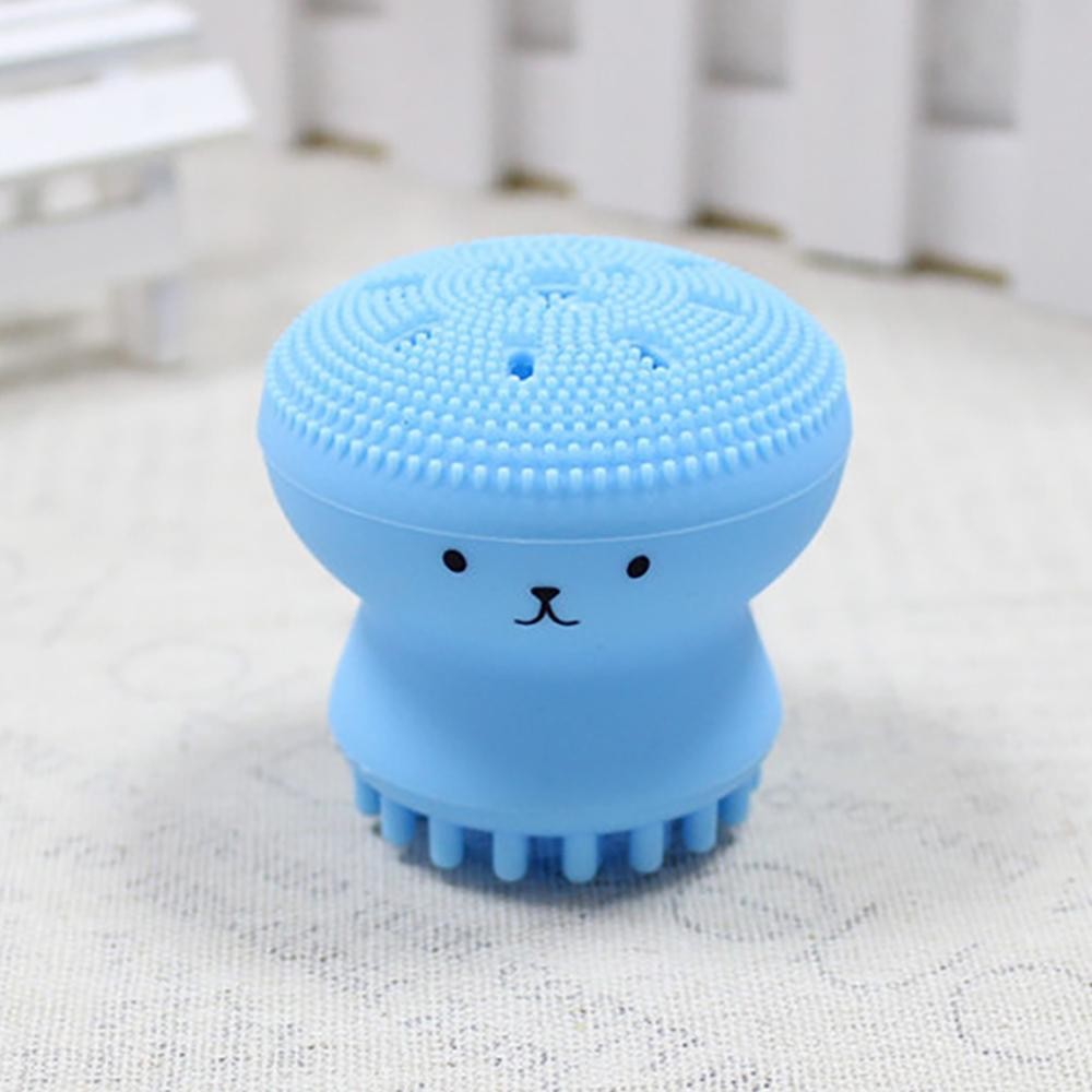 Silicon Facial Cleansing Massager - Soft Food Grade Silicon - Approximately 2.25"W X 2"T How To Use: 1. Wet Silicon Brush 2. Place Cleanser Inside 3. Lather & Massage Skin view 2
