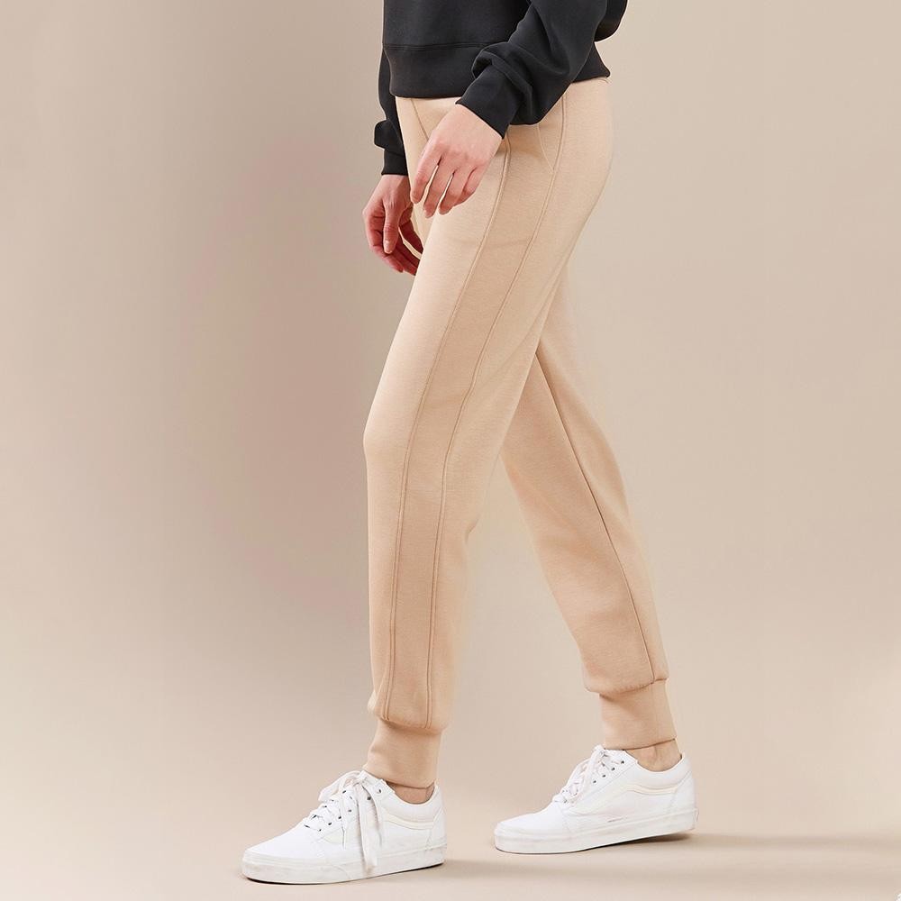 Women’s Sporty Chic UltraComfy Joggers - Drawstring - Two pockets - Solid color - Elasticized waistband - Stretchy - Comfortable and relaxed fit - Imported - 40% Terylene 55% Rayon 5% Spandex view 4