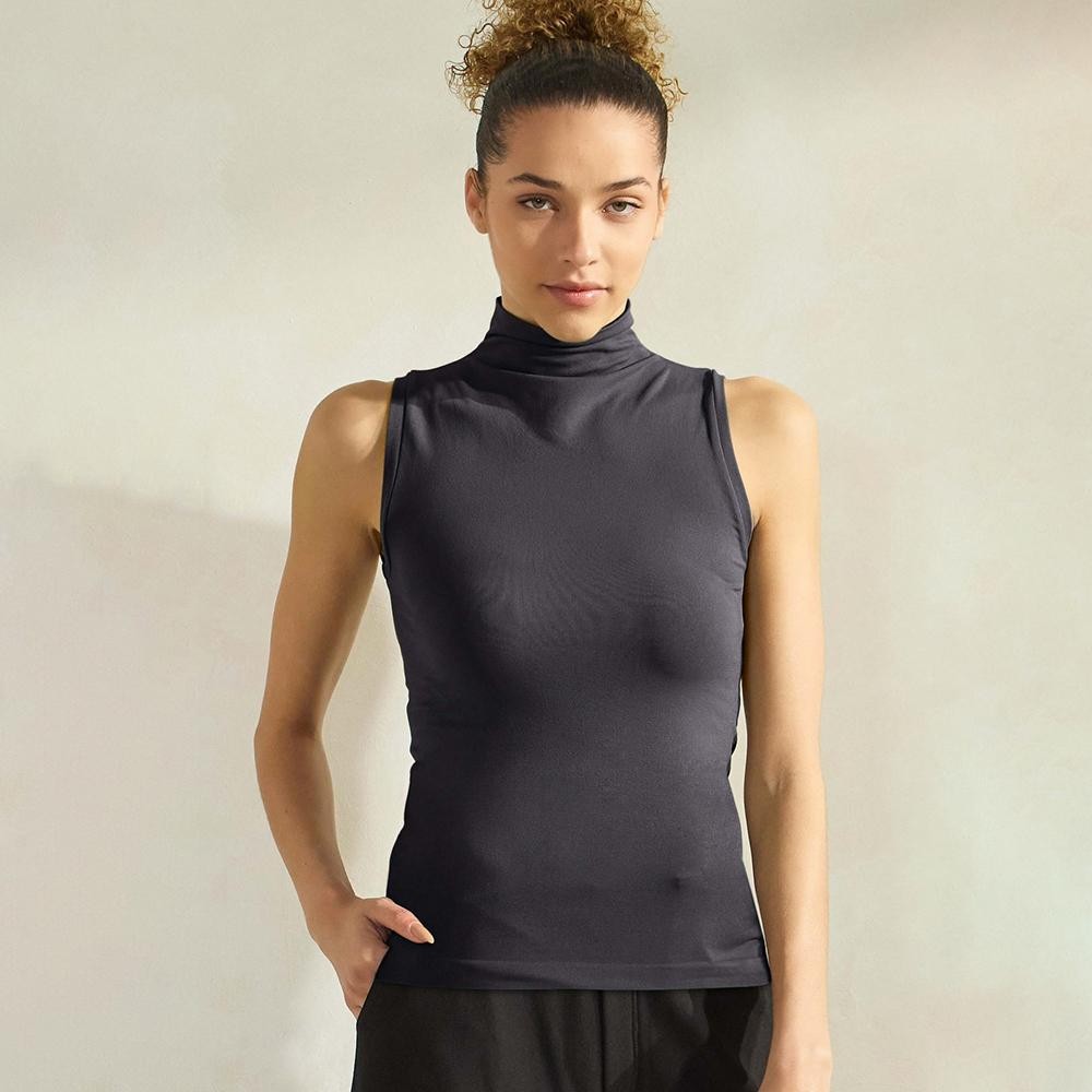 Women's Mock Neck Seamless Sleeveless Tank •Seamless Mock Neck •Self Fabric Armhole Band •Bra-friendly Tank • Imported •92% Nylon, 8% Spandex view 2