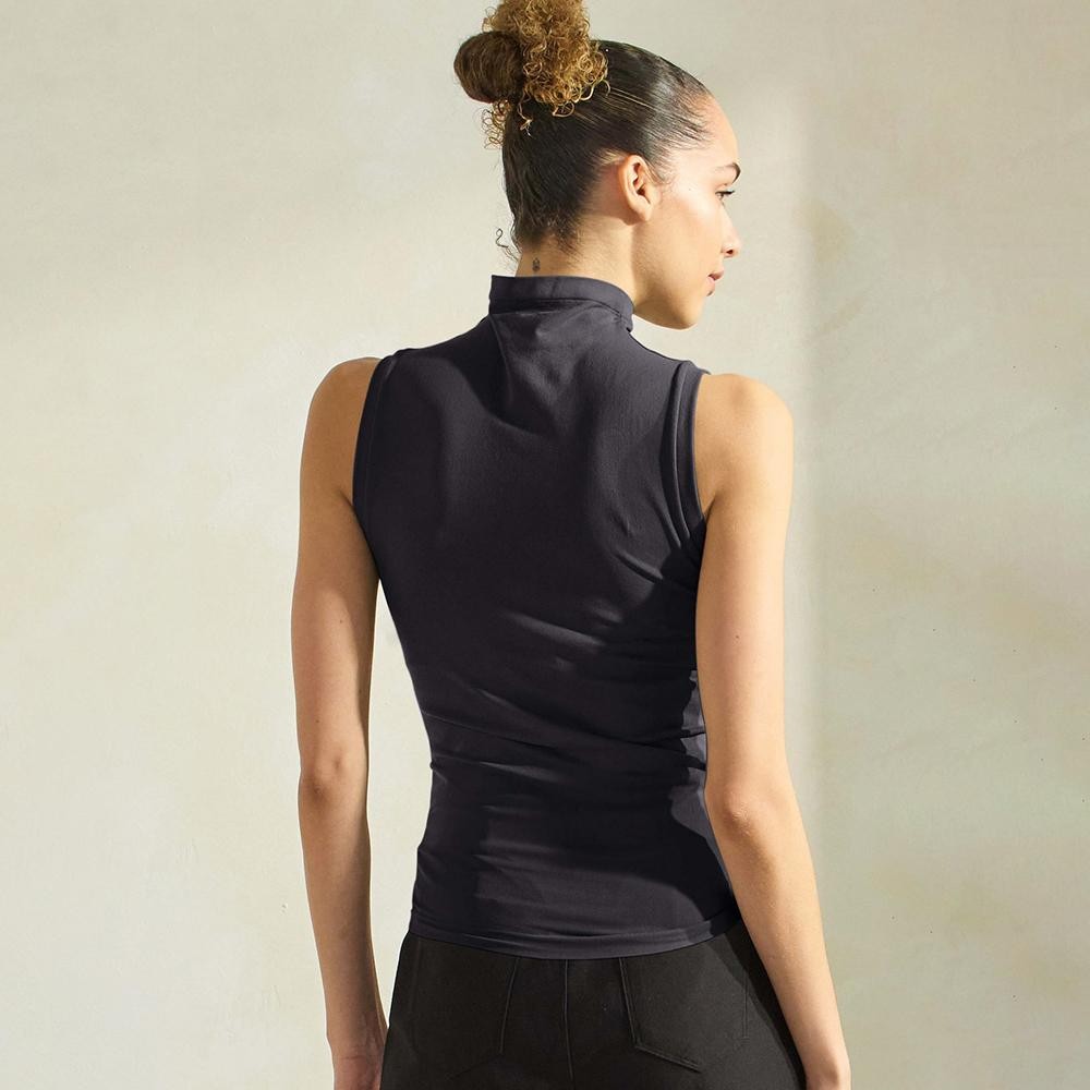 Women's Mock Neck Seamless Sleeveless Tank •Seamless Mock Neck •Self Fabric Armhole Band •Bra-friendly Tank • Imported •92% Nylon, 8% Spandex view 6
