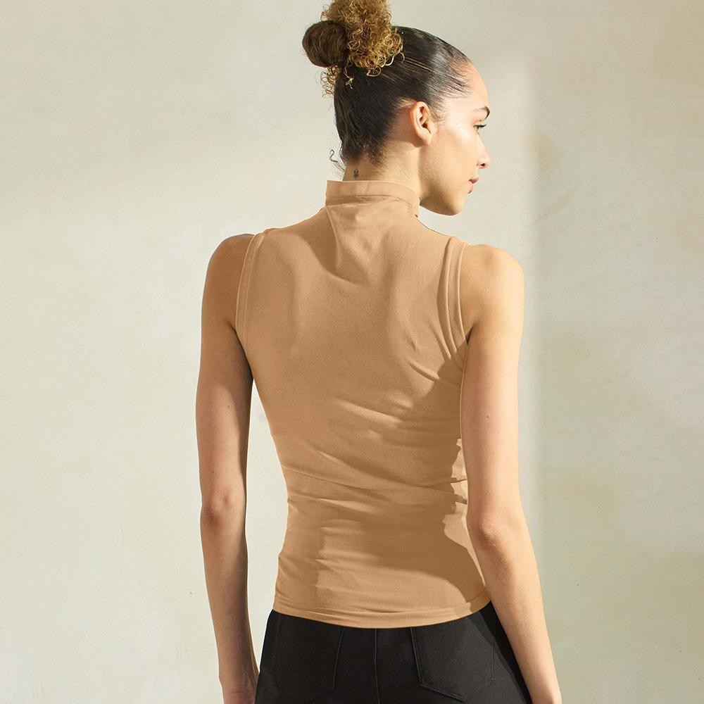 Women's Mock Neck Seamless Sleeveless Tank •Seamless Mock Neck •Self Fabric Armhole Band •Bra-friendly Tank • Imported •92% Nylon, 8% Spandex view 4
