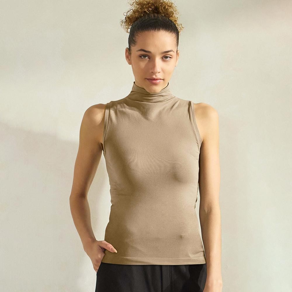 Women's Mock Neck Seamless Sleeveless Tank •Seamless Mock Neck •Self Fabric Armhole Band •Bra-friendly Tank • Imported •92% Nylon, 8% Spandex view 2