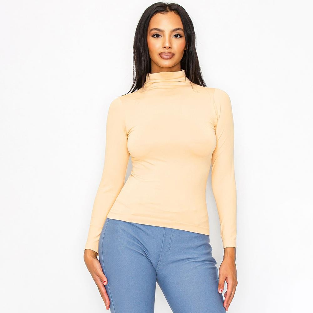 Women’s Bare Essential Seamless Mock Neck Long Sleeve Top • Mock neck • Seamless design • Long sleeves • Smooth • Soft and stretchy fabric • Durable • Imported •92% Nylon, 8% Spandex view 2