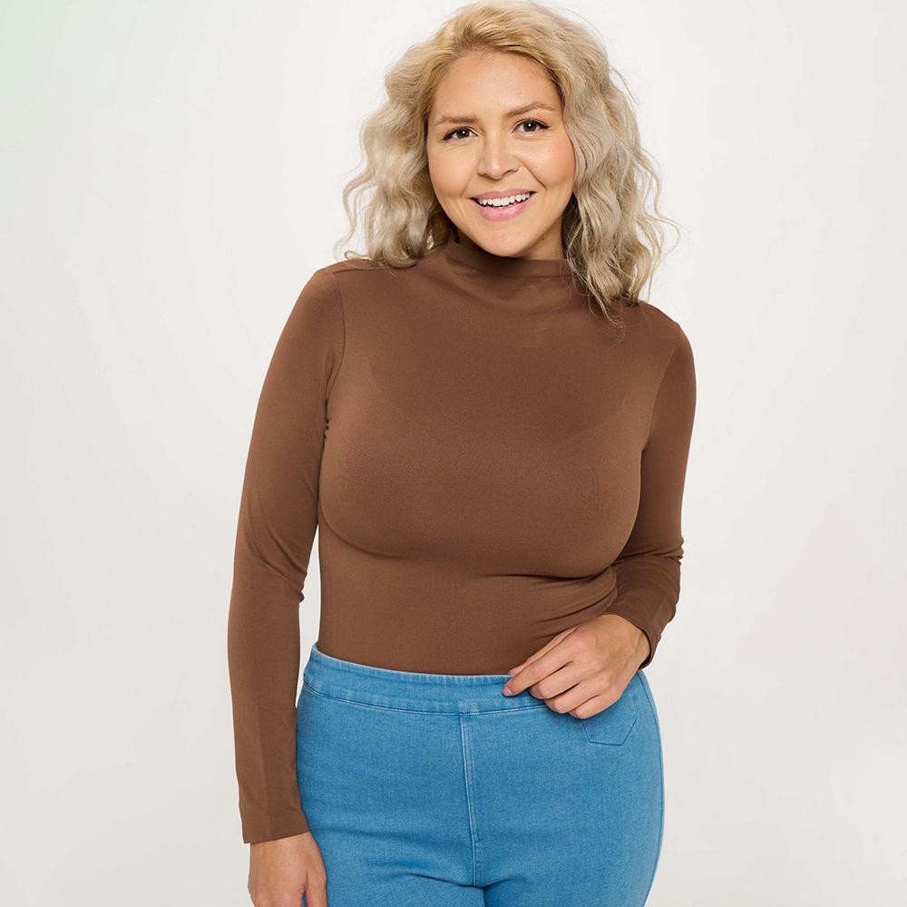 Women’s Bare Essential Seamless Mock Neck Long Sleeve Top • Mock neck • Seamless design • Long sleeves • Smooth • Soft and stretchy fabric • Durable • Imported •92% Nylon, 8% Spandex view 2